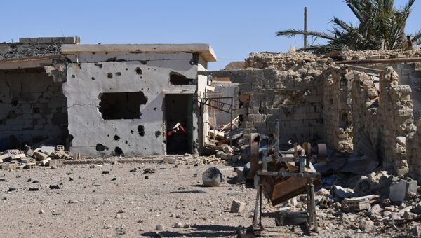 Разрушенный дом в сирийском городе. Архивное фото