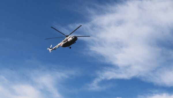 Вертолет МЧС, задействованный в поисковых работах. Архивное фото