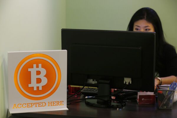Сотрудник биткоин-биржи в Гонконге Сотрудник биткоин-биржи в Гонконге