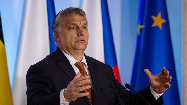 Премьер-министр Венгрии Виктор Орбан во время выступления на встрече стран Вишеградской четверки в Варшаве. 19 июня 2017