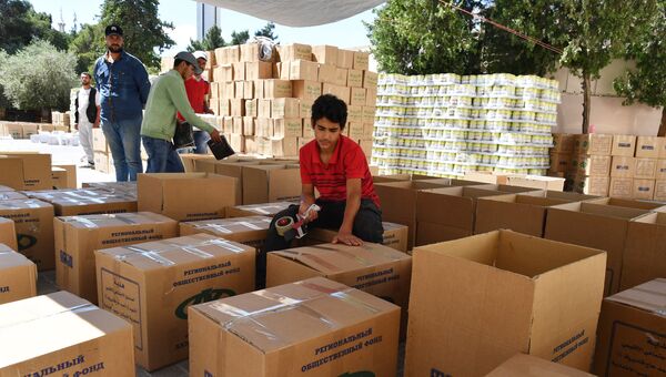 Подготовка и распределение гуманитарной помощи от фонда Ахмата Кадырова. Архивное фото