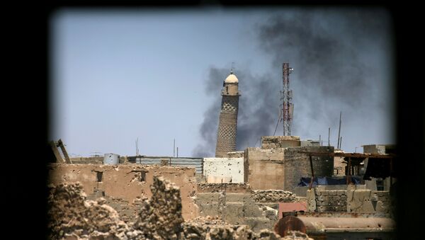 Минарет аль-Хадба в исторической части Мосула. 1 июня 2017
