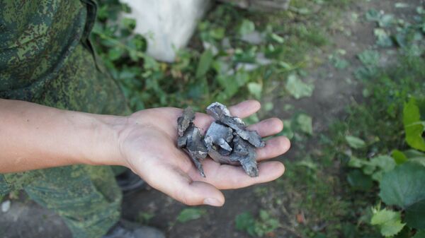 Осколки боеприпасов, выпущенных ВСУ по городу в ЛНР. Архивное фото