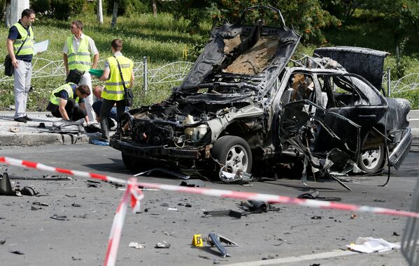 Автомобиль Mercedes в Соломенском районе Киева после взрыва. 27 июня 2017