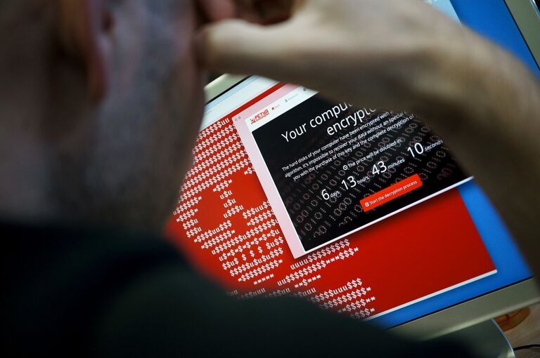 Информационные сообщения вируса-вымогателя Petya на экране монитора Информационные сообщения вируса-вымогателя Petya на экране монитора