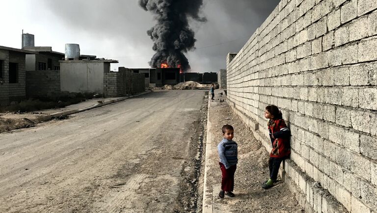 Работа фотографа из Нью-Йорка Sebastiano Tomada Children of Qayyarah, получившая Гран-при в номинации Фотограф года в iPhone Photography Awards 2017