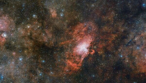 Облако газа Sharpless 2-54, туманности Орла и Омега снятые телескопом VST