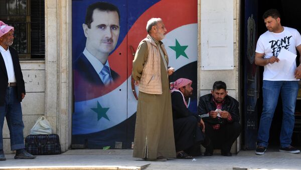 Портрет Башара Асада в Камышлы