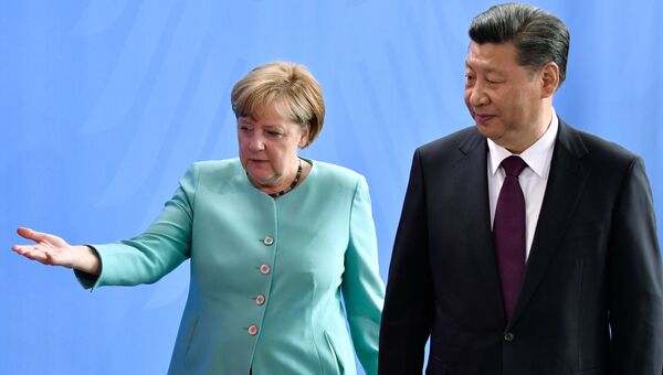 Канцлер Германии Ангела Меркель и председатель КНР Си Цзиньпин во время встречи в Берлине. 5 июля 2017