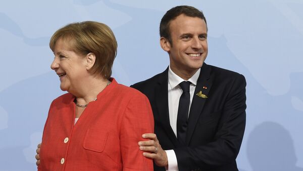 Канцлер ФРГ Ангела Меркель и президент Франции Эммануэль Макрон в первый день саммита G-20 в Гамбурге