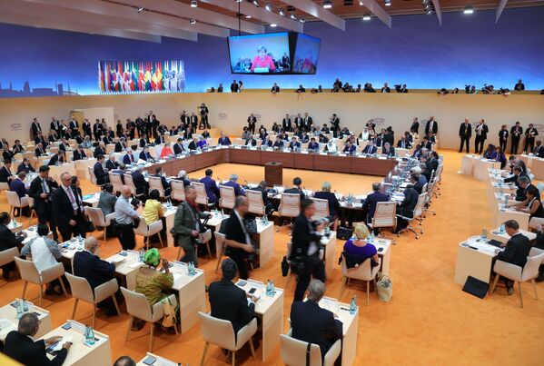 Заседании глав делегаций государств-участников Группы двадцати G20, приглашенных государств и международных организаций в Гамбурге. 7 июля 2017