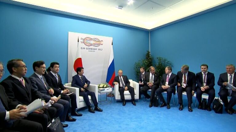 Встреча Путина с премьер-министром Японии Синдзо Абэ на саммите G20 Встреча Путина с премьер-министром Японии Синдзо Абэ на саммите G20