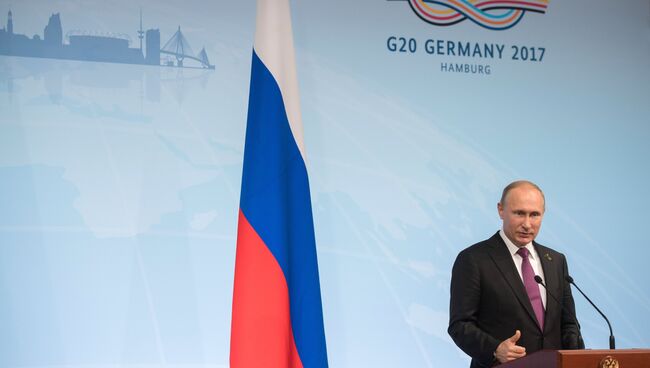 Президент РФ Владимир Путин во время пресс-конференции по итогам саммита лидеров Группы двадцати G20 в Гамбурге. 8 июля 2017