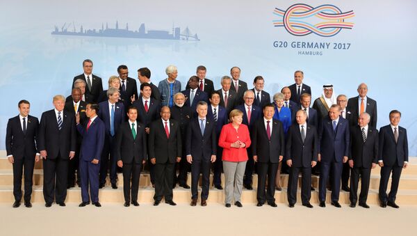 Президент РФ Владимир Путин на церемонии совместного фотографирования глав делегаций государств-участников Группы двадцати G20
