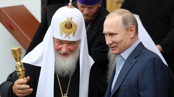 Президент РФ Владимир Путин и патриарх Московский и всея Руси Кирил