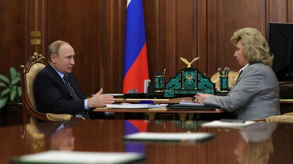 Президент РФ Владимир Путин и уполномоченный по правам человека Татьяна Москалькова во время встречи