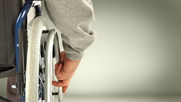 Инвалидная коляска. Архив
