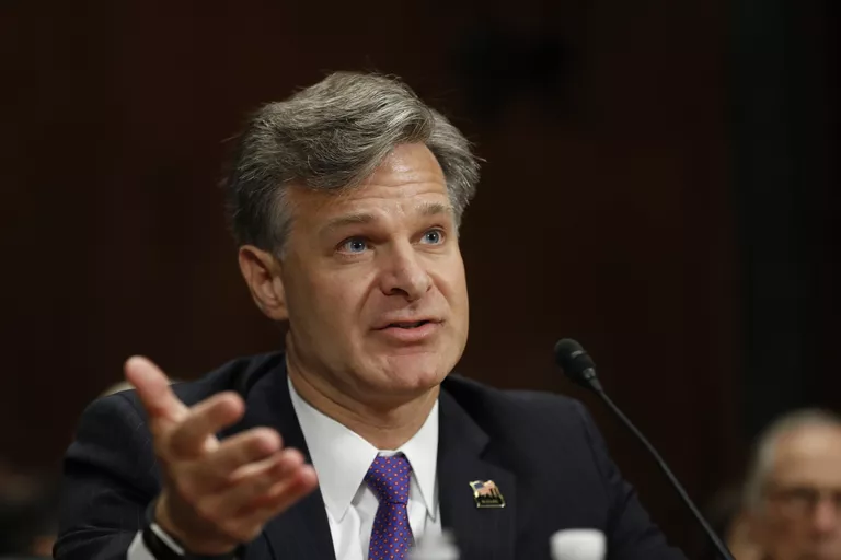 Номинант президента США Дональда Трампа на пост директора ФБР Кристофер Рей в Вашингтоне. 12 июля 2017 Номинант президента США Дональда Трампа на пост директора ФБР Кристофер Рей в Вашингтоне. 12 июля 2017