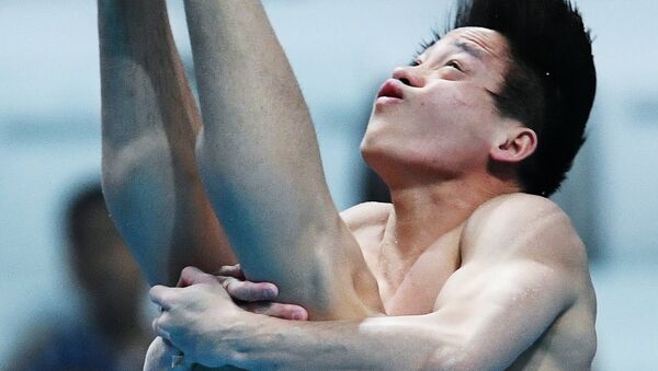 Чао Хэ (КНР) в финальных соревнованиях по прыжкам в воду с трамплина 1 м среди мужчин на чемпионате мира FINA 2017
