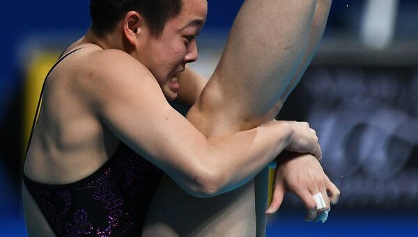 Ивэнь Чэнь (КНР) в финале командных соревнований по прыжкам в воду на чемпионате мира FINA 2017