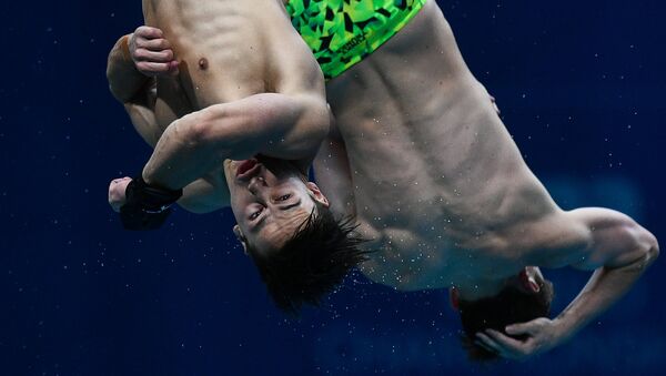Домоник Беджгуд и Деклан Стейси (Австралия) в финальных соревнованиях по синхронным прыжкам в воду с вышки 10 м среди мужчин на чемпионате мира FINA 2017