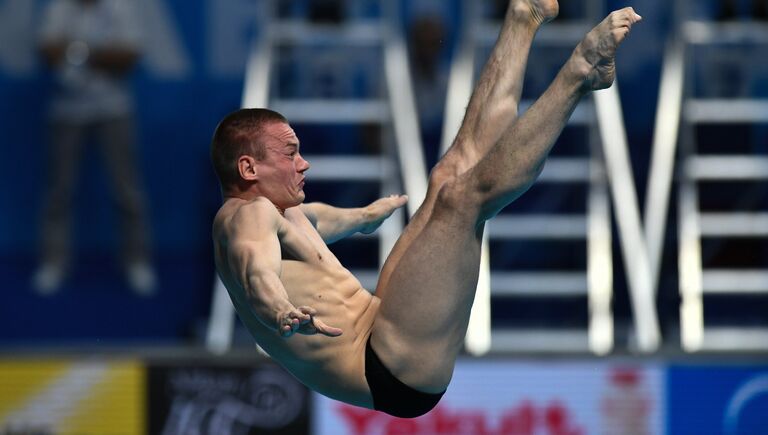 Евгений Кузнецов (Россия) в финале командных соревнований по прыжкам в воду на чемпионате мира FINA 2017