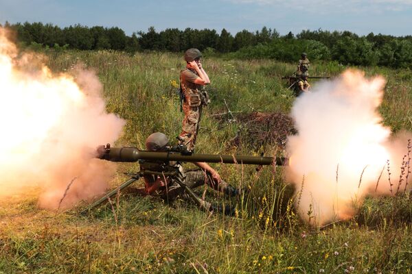 Украинские военнослужащие во время учений в Львовской области Украинские военнослужащие во время учений в Львовской области