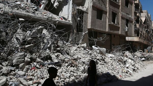 Руины в восточном пригороде Дамаска Гуте. 19 июля 2017