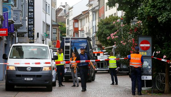 На месте нападения неизвестного человека с бензопилой в Шаффхаузене, Швейцария. 24 июля 2017