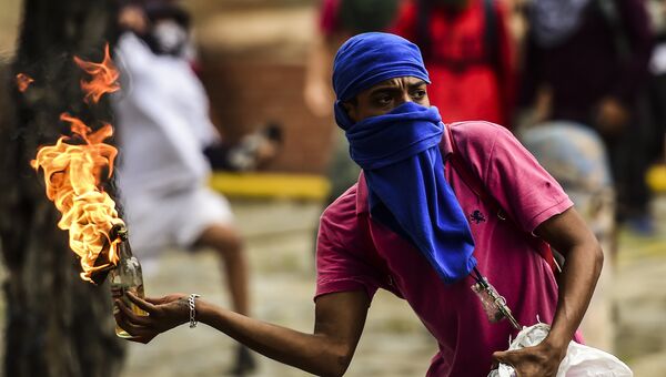 Беспорядки в Каракасе. Архивное фото