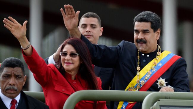 Силия Флорес, жена президента Венесуэлы, и президент Венесуэлы Николас Мадуро в Каракасе. Архивное фото