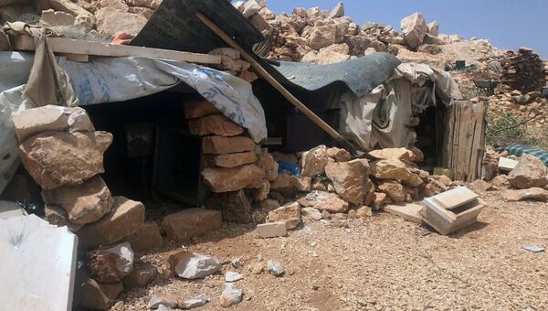 Место базирования террористов Джебхат-ан-Нусра (организация запрещена в РФ) в горном районе Эрсаль на ливано-сирийской границе в долине Увейни. 28 июля 2017