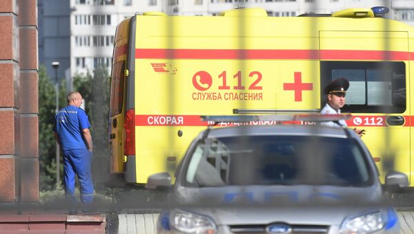 Автомобиль скорой медицинской помощи у здания Московского областного суда, в котором произошла перестрелка. 1 августа 2017