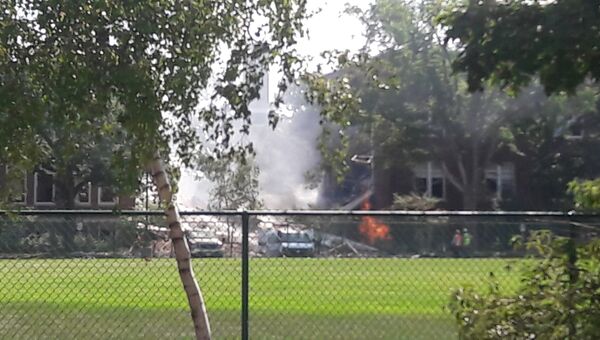 Последствия взрыва газа в здании школы в американском Миннеаполисе. 2 августа 2017