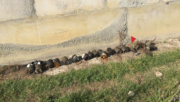 Снаряды, разлетевшиеся после подрыва складов в посёлке Приморский, Абхазия. 3 августа 2017