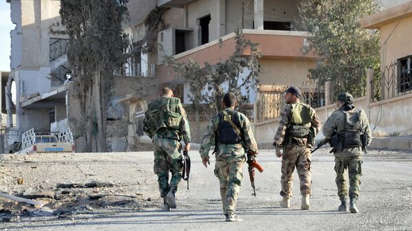 Сирийские солдаты в центральной части Сирии в Хомсе