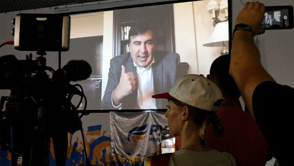 Видеотрансляция выступления Михаила Саакашвили из США в киевском офисе его политической партии. Архивное фото