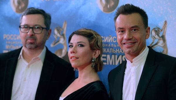 Участники группы Дискотека Авария: Алексей Рыжов, Анна Хохлова и Алексей Серов (слева направо). Архивное фото