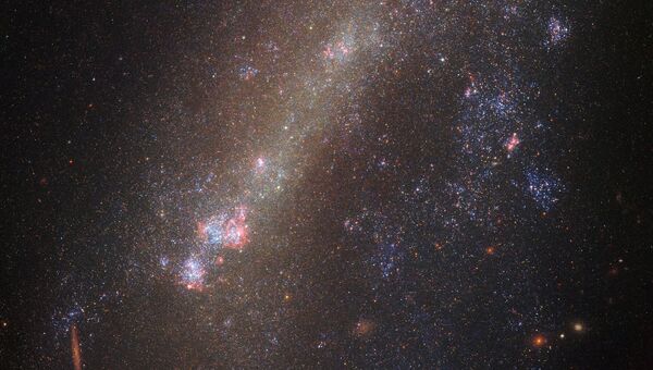 Галактики IC 1727 и NGC 672, столкнувшиеся в недавнем прошлом
