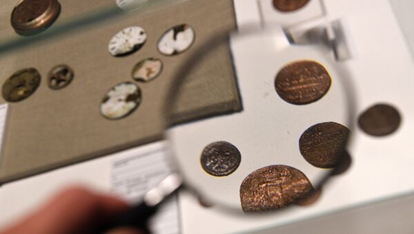 Монеты на выставке Тайны московских подземелий в Музее Москвы