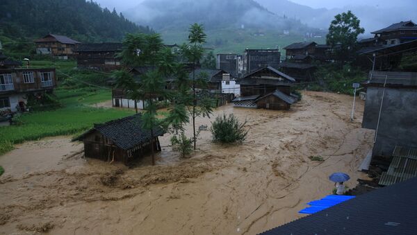 Наводнение, вызванное дождями в  Гуанси-Чжуанском  автономном районе Китая. 13 августа 2017