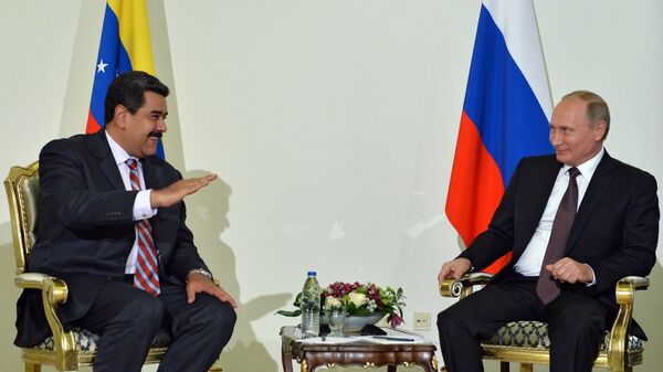 Президент РФ Владимир Путин и президент Венесуэлы Николас Мадуро во время встречи