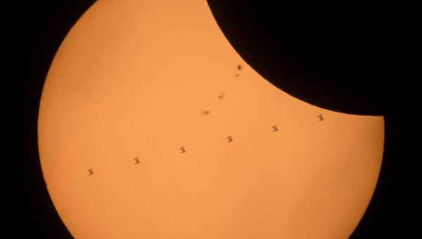 Транзит Международной космической станции во время солнечного затмения. 21 августа 2017