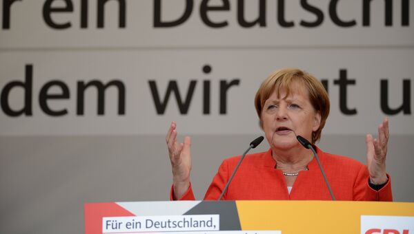 Канцлер Германии Ангела Меркель во время предвыборной встречи с избирателями в Мюнстере. 22 августа 2017