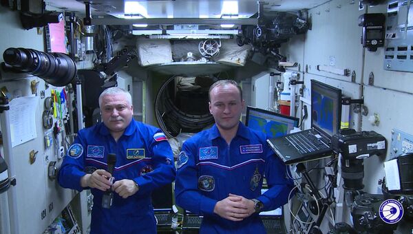Космонавты с МКС поздравили москвичей с Днем города