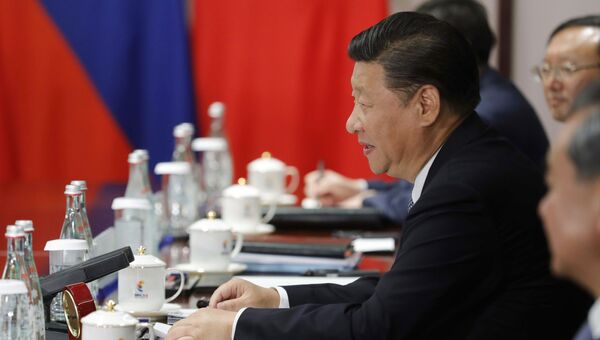 Председатель КНР Си Цзиньпин во время переговоров с президентом РФ Владимиром Путиным на полях саммита БРИКС в Сямэне. 3 сентября 2017