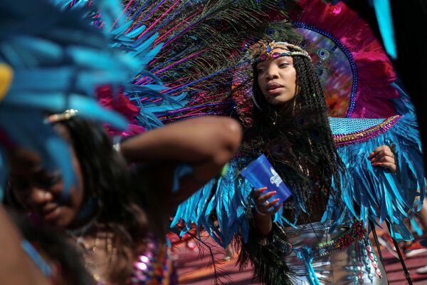 Участница парада карибской культуры в Бруклине