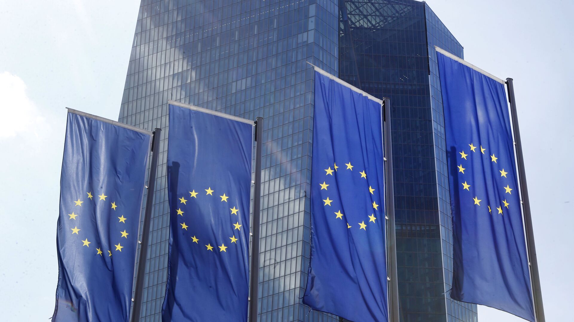 EU flags at the European Central Bank's headquarters in Frankfurt, Germany