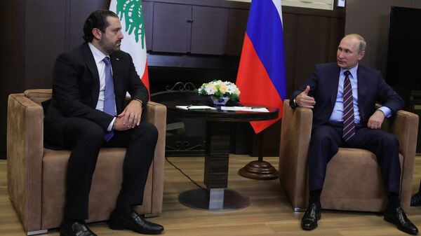 Президент РФ Владимир Путин и председатель Совета министров Ливанской Республики Саад Харири во время встречи. 13 сентября 2017