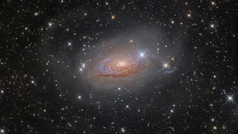 Снимок фотографа Олега Брызгалова из Украины M63 Star Streams and the Sunflower Galaxy, победивший в категории Галактики в фотоконкурсе Insight Astronomy Photographer of the Year 2017